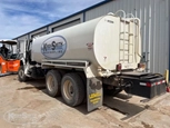 Used Water Truck,Used Water Truck in yard,Used Ledwell in yard,Front of used Ledwell Water Truck